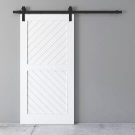A white sliding barn door with diagonal panel designs is mounted on a black metal track against a plain gray wall.