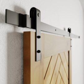 A close-up of the Nuvo 83" x 40" Barn Door mounted on a black metal rail attached to a white wall.
