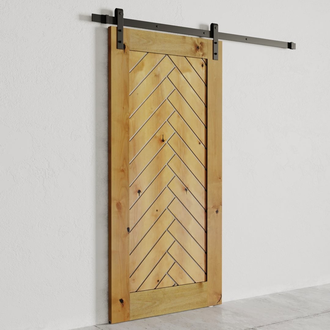 Urban Woodcraft Nuvo Barn Door – Knotty Alder 4 The Nuvo 83" x 40" Barn Door, featuring a chevron pattern, installed on a metal sliding track and mounted against a plain white wall.