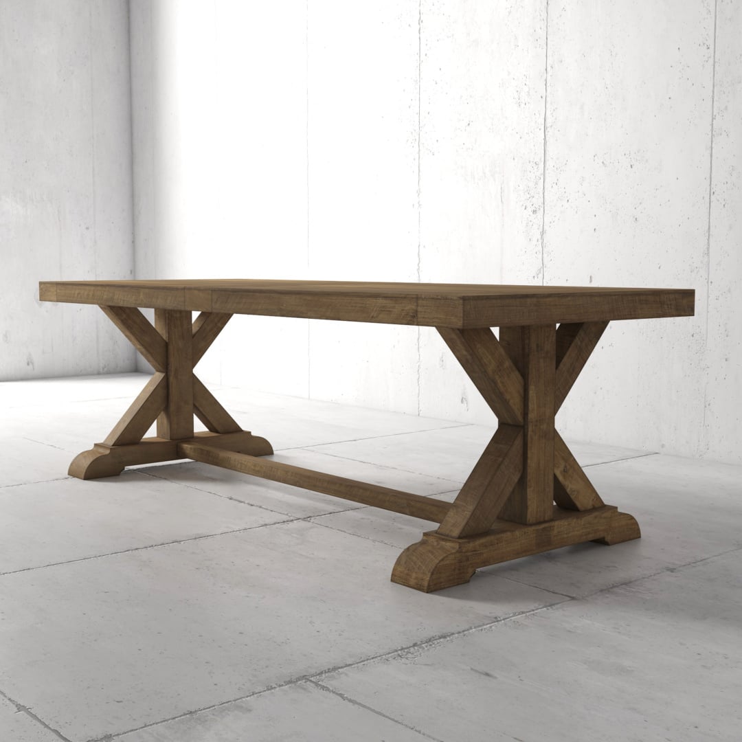 98 120 Maderra - 1 The Madera Dining Table - Natural, featuring a wooden rectangular design with X-shaped supports, stands on a light gray tiled floor against a plain gray concrete wall.