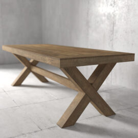 The Grand Cross Dining Table, featuring a wooden rectangular top and X-shaped legs, stands on a tiled floor in a minimalistic, light gray room.