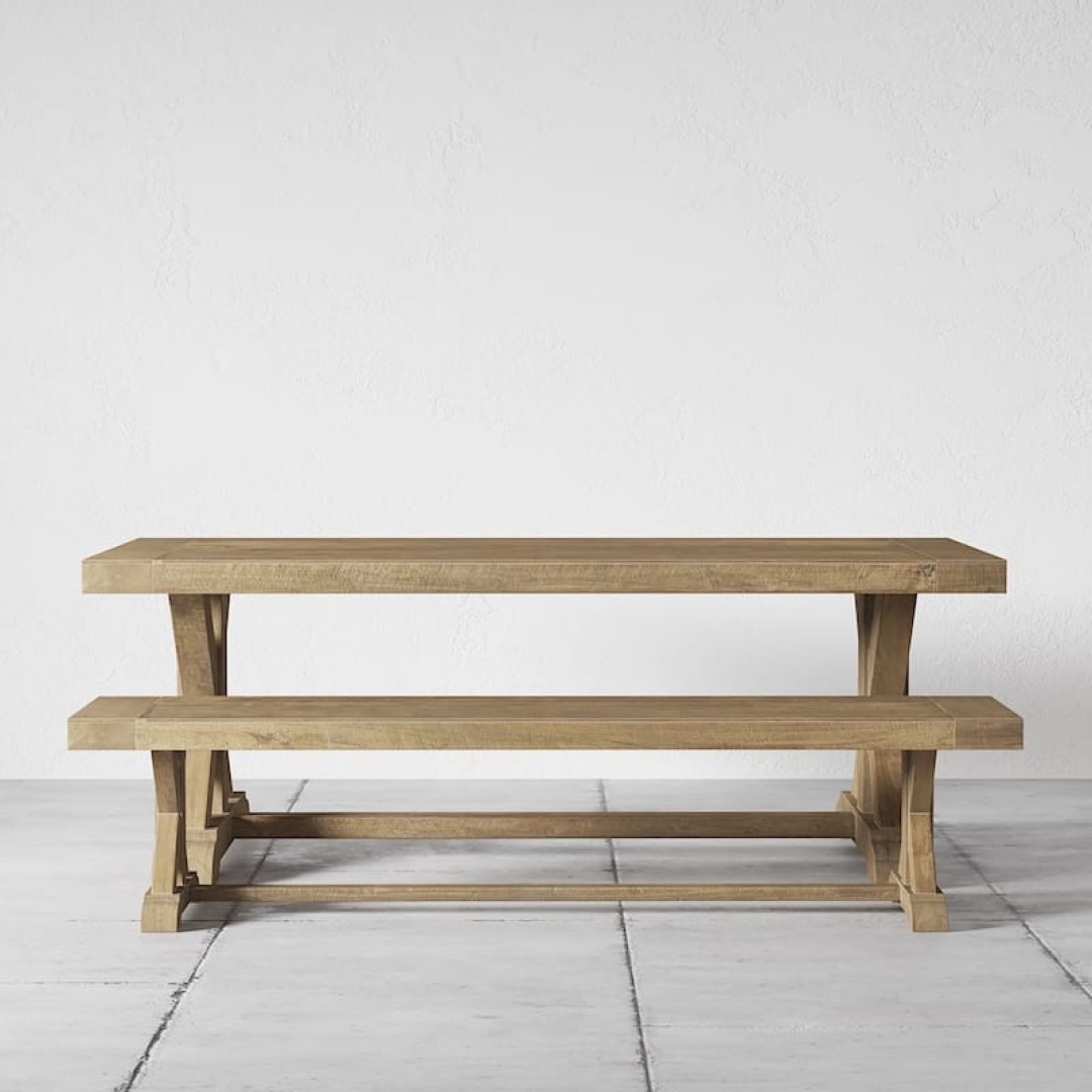 Madera Dining Benches flank either side of a wooden dining table, all set on a light-colored tiled floor against a plain white background.