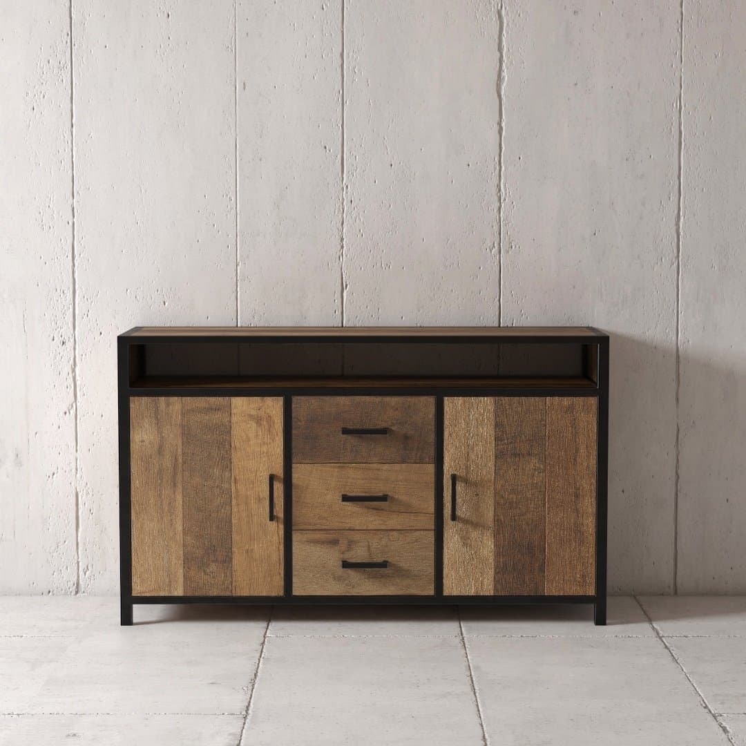 A wooden sideboard, reminiscent of an elegant dining buffet, combines light and dark wood panels with two cabinets on either side and three central drawers, standing proudly against a plain, light-colored wall.