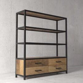 The Opus 25" Bookshelf, featuring three open shelves and two drawers at the bottom, stands against a plain concrete wall.