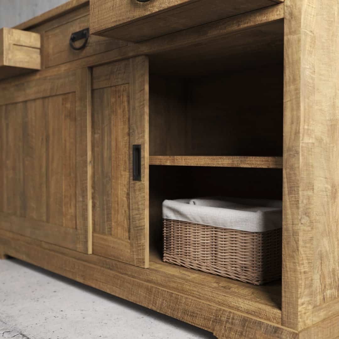 Urban Woodcraft 65 Riverbend Dining Buffet - Natural (6) The Riverbend Sliding Door Dining Buffet features a wooden cabinet design with an open shelf that includes a wicker basket, along with a drawer and a closed compartment situated above the shelf.