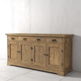 The Riverbend Dining Buffet, a wooden sideboard with a rustic finish, featuring four drawers and four cabinets, stands elegantly against a white textured wall.