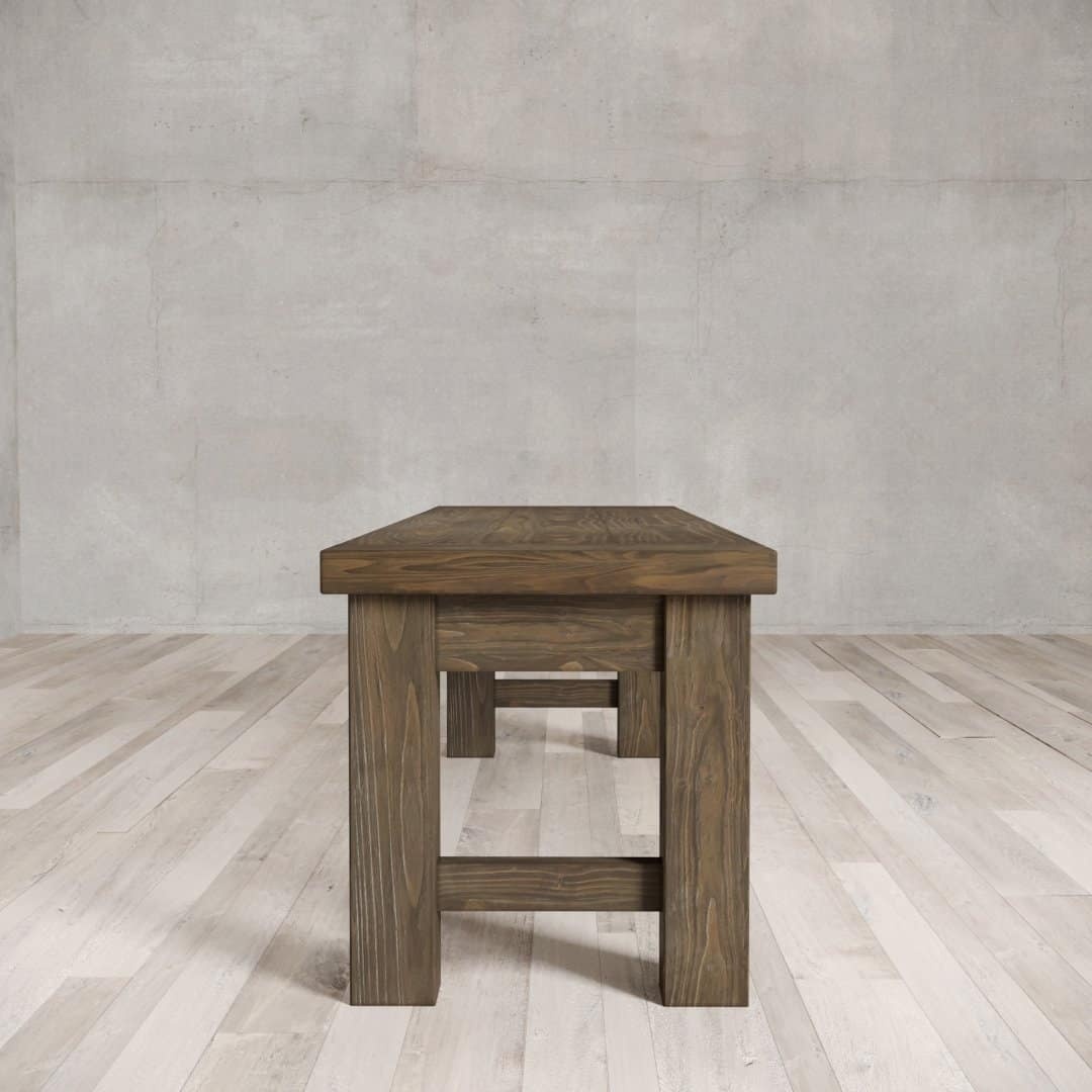 Urban Woodcraft 70 Squre Bench - Salvaged Espresso (3) A square dining bench placed on a light-colored wooden floor against a concrete wall.
