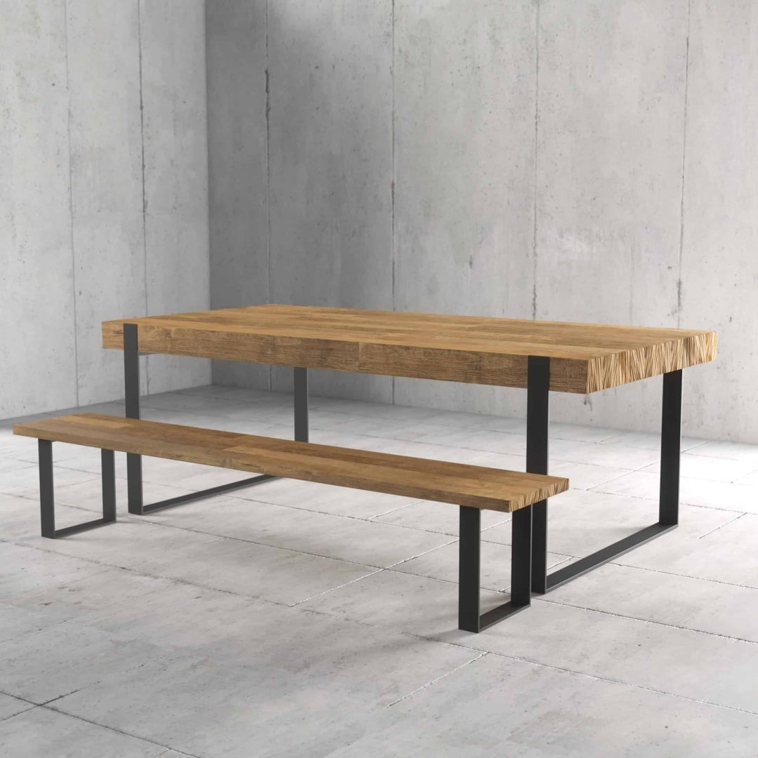 Urban Woodcraft 75 Soma Bench - Natural with Table The Soma Dining Bench, with its minimalist wooden design and matching table, sits elegantly on a concrete floor. The set features metal legs and is complemented by an unfinished concrete wall backdrop.
