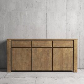 The Teca Dining Buffet with three drawers and two cabinet doors stands against a bare concrete wall.