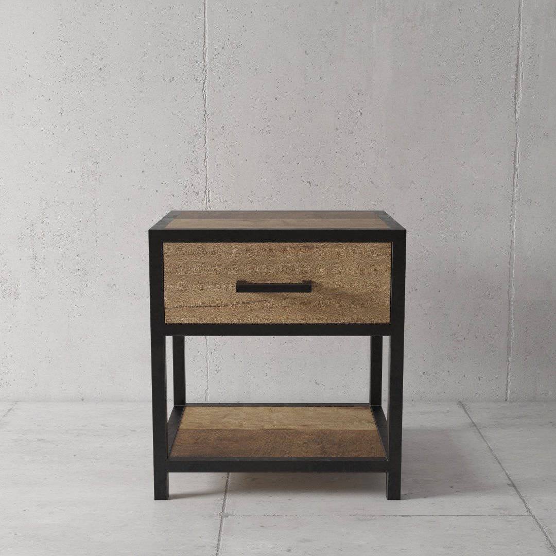 An *Opus Bedside End Table* with a black frame, a wooden top, one drawer with a handle, and an open lower shelf, set against a plain concrete wall.