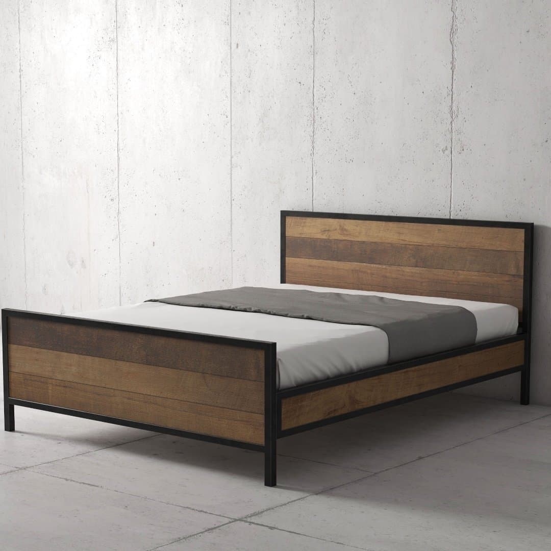 The Opus Bed showcases a minimalist wooden frame with a sturdy metal base, boasting a natural wood finish. It is elegantly dressed in a simple white mattress and complemented by a gray blanket, set against the backdrop of a plain concrete wall.