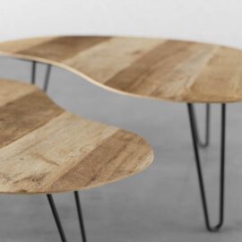 Placed on a gray floor against a light background, the 2-Piece Organic Coffee Table with Hairpin Legs features two modern tables with wooden tabletops and black hairpin legs.