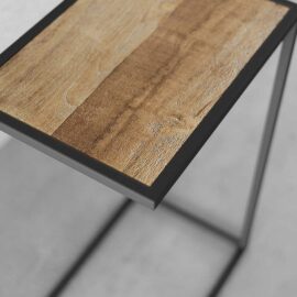 A close-up view of the Side Table featuring a rectangular wooden tabletop with a black metal frame, set against a light gray background.