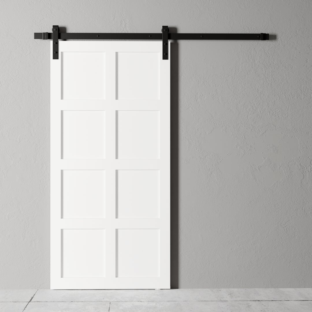 A Lucas 83" x 40" Reclaimed Wood Arrow Barn Door with a black metal track is mounted on a gray wall.