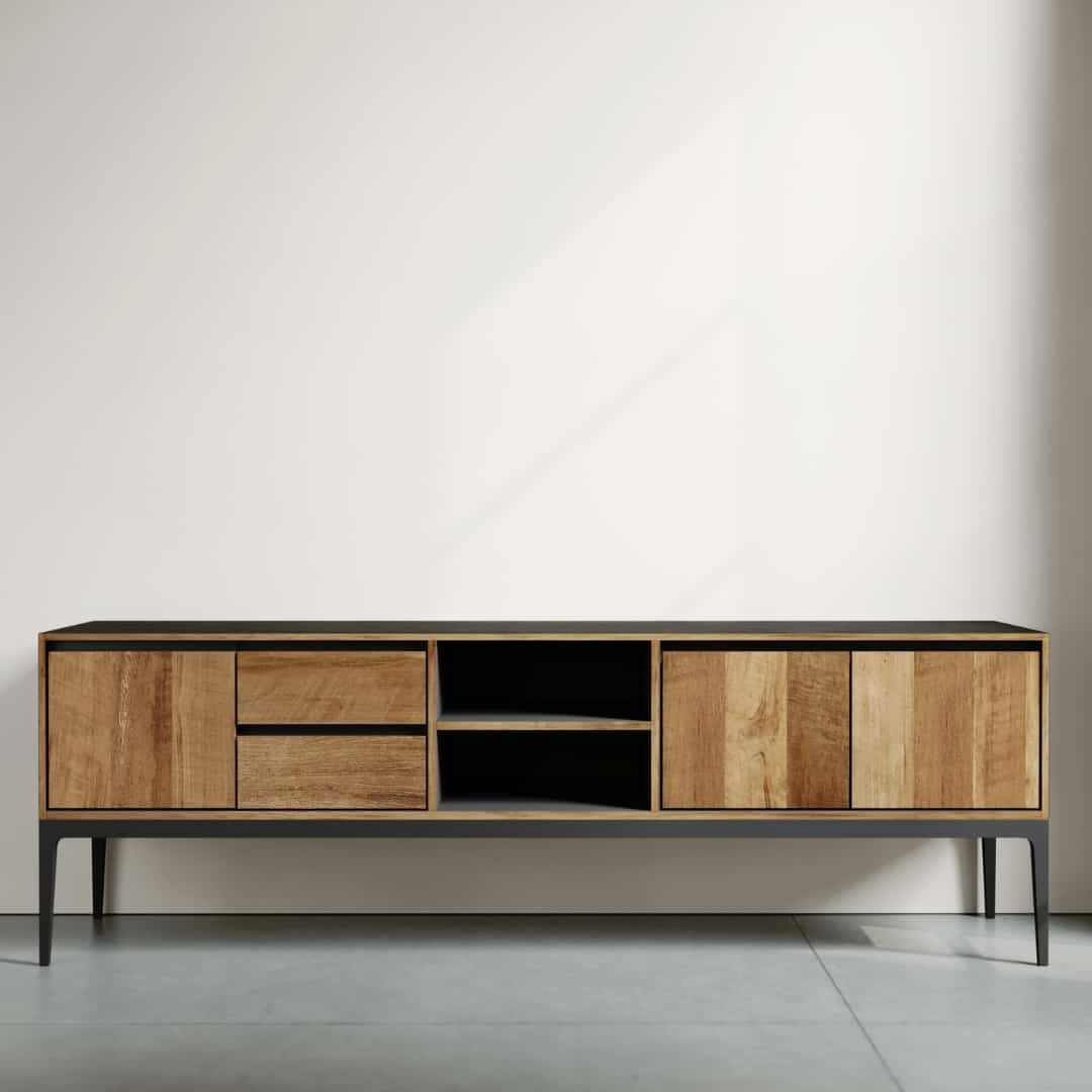 The Kolt 68" 2 Shelf TV Stand, featuring a modern wooden design with black legs and three cabinets on each side, two drawers, and open shelves in the center, is placed against a light-colored wall.