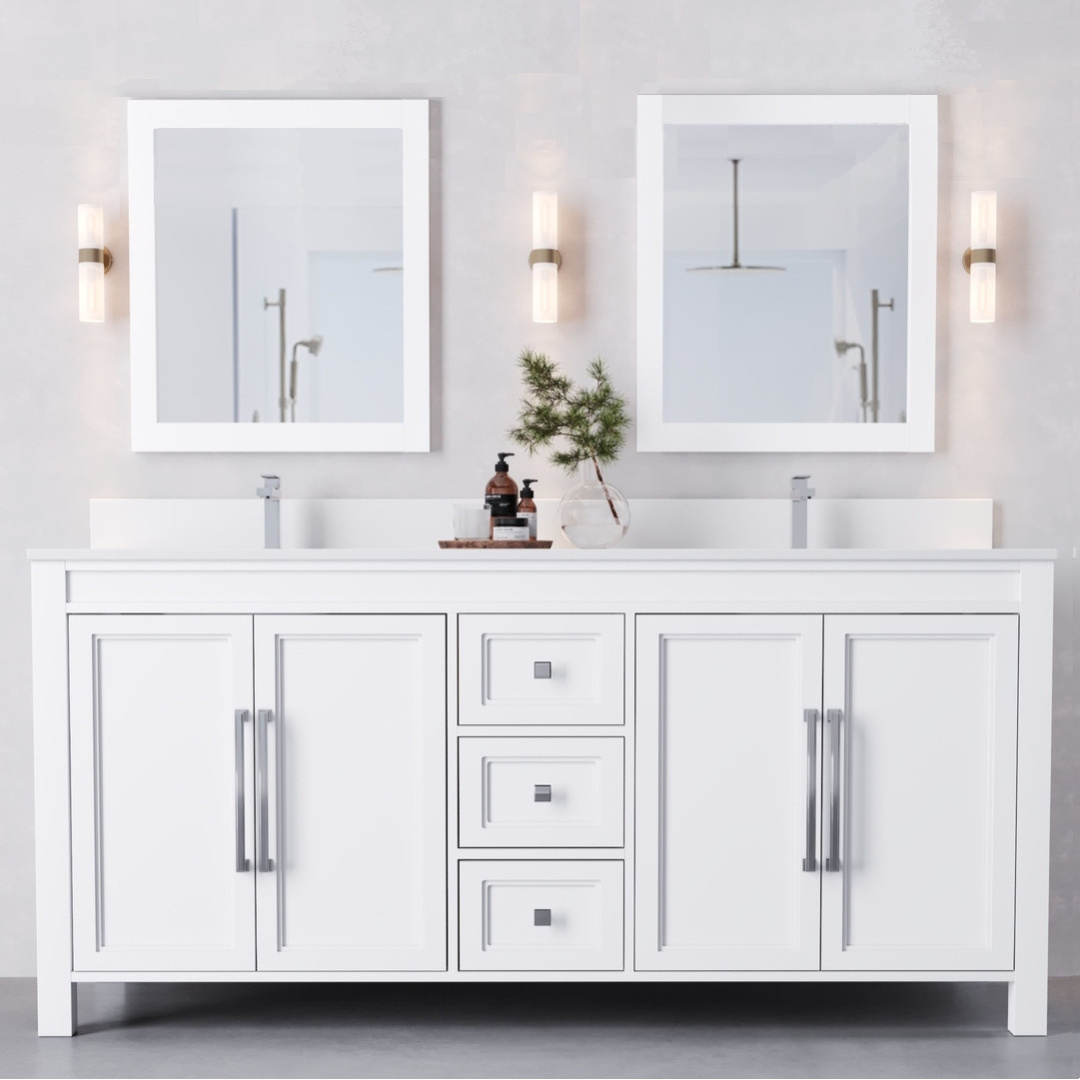 The Belluno 72" double-sink bathroom vanity features white cabinetry, two rectangular mirrors, and wall-mounted lights. Items on the counter include soap dispensers and a small plant.