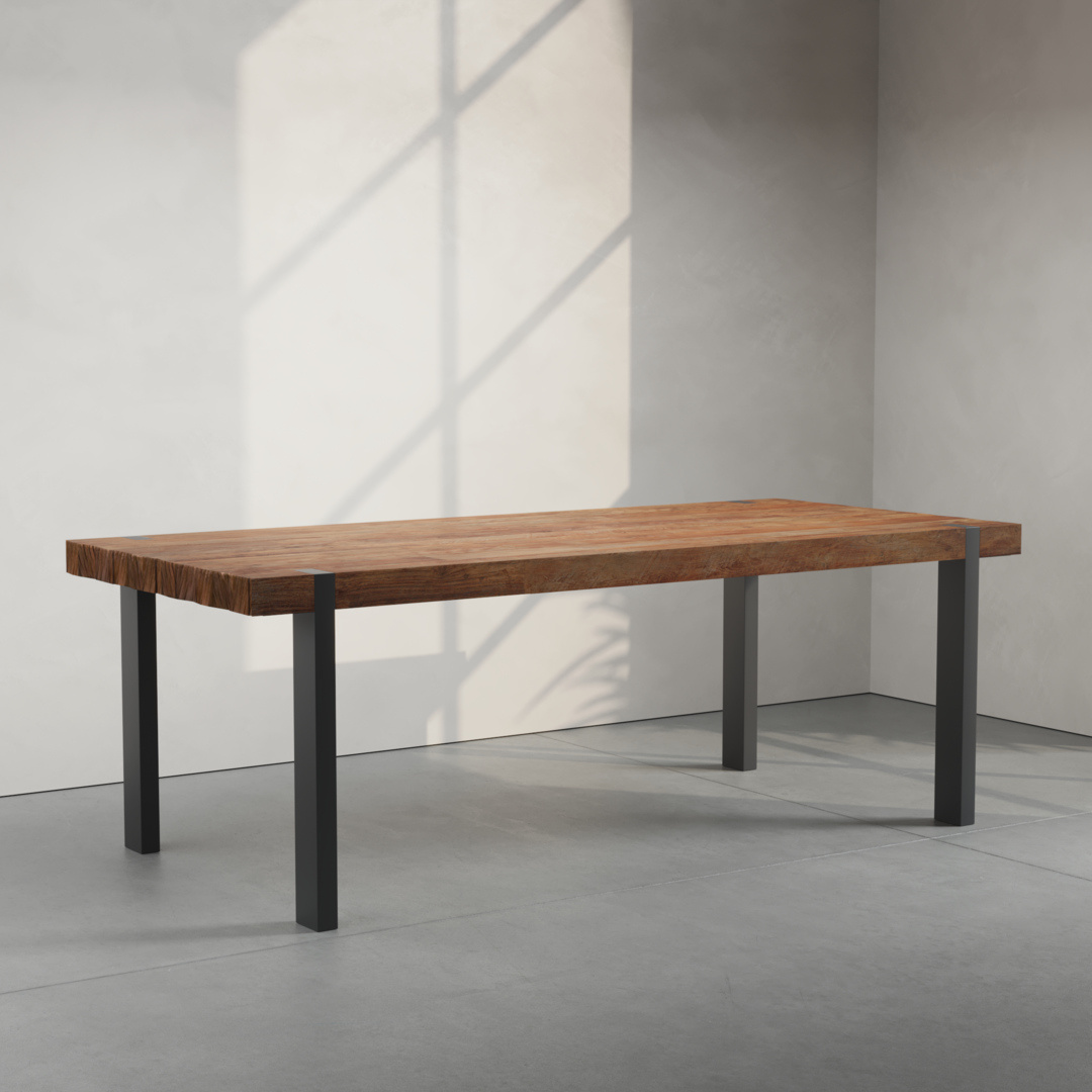 The Beam Dining Table, featuring a rectangular wooden top and four sleek metal legs, stands elegantly in a minimalistic room with a shadow cast on the wall.