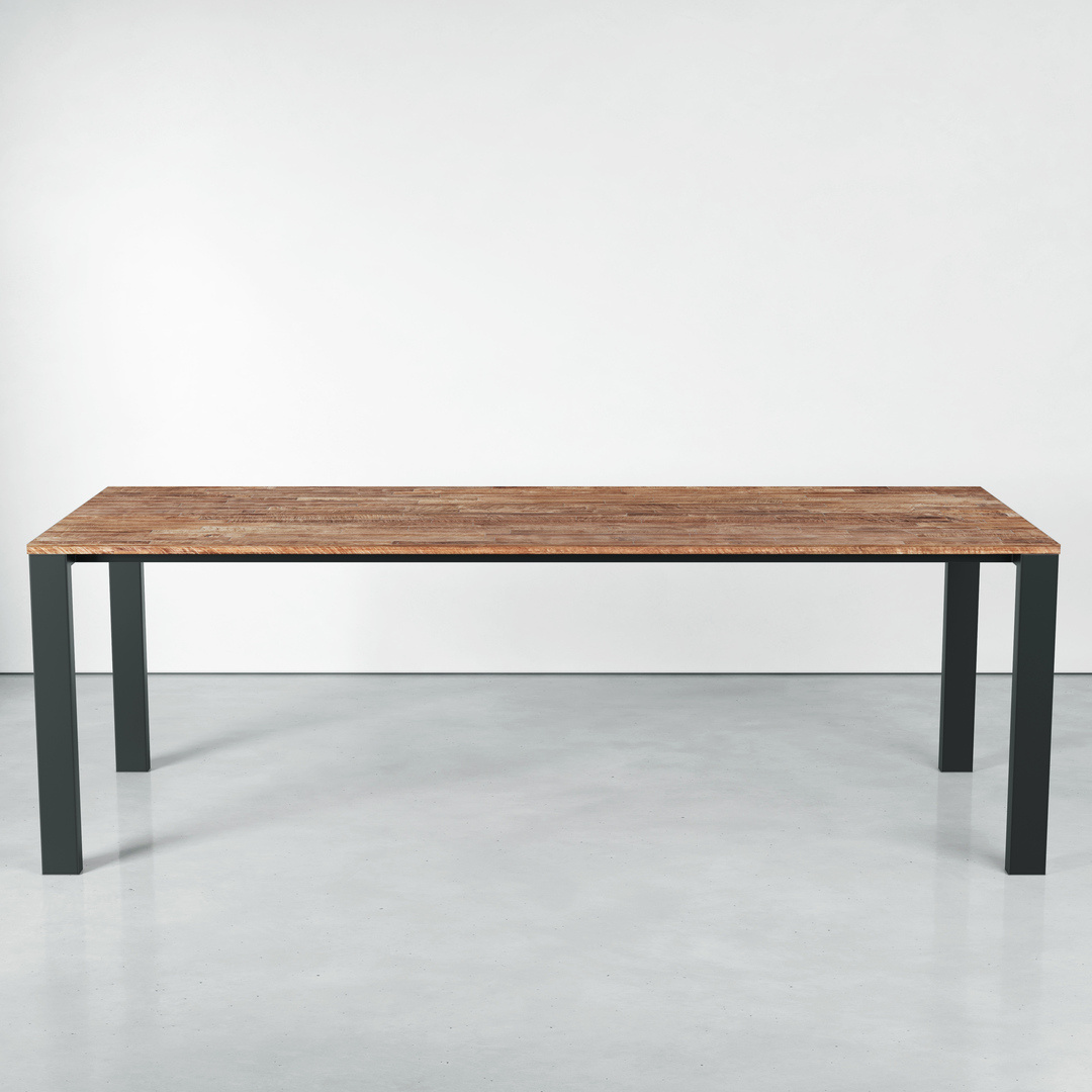A sleek Metal Dining Table featuring a wooden rectangular top and sturdy black metal legs stands on a smooth, light-colored floor against a plain white wall.