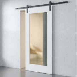 The 1-Panel Barn Door (White) with a frosted glass panel is mounted on a black metal track, positioned against a light gray wall. The door is partially open.