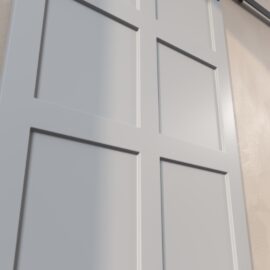 Close-up of an 8-Panel Barn Door in light grey with a smooth finish, partially open against a beige wall. The door has six rectangular sections and is mounted on a sliding track.