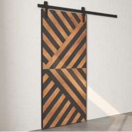 The Celestia Reclaimed Wood Barn Door (Espresso) features a black metal frame and diagonal wood panel design, mounted on a sliding track against a plain white wall.