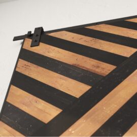 The Enigma Reclaimed Wood Barn Door Espresso features a black metal track and alternating black and natural wood horizontal stripes.