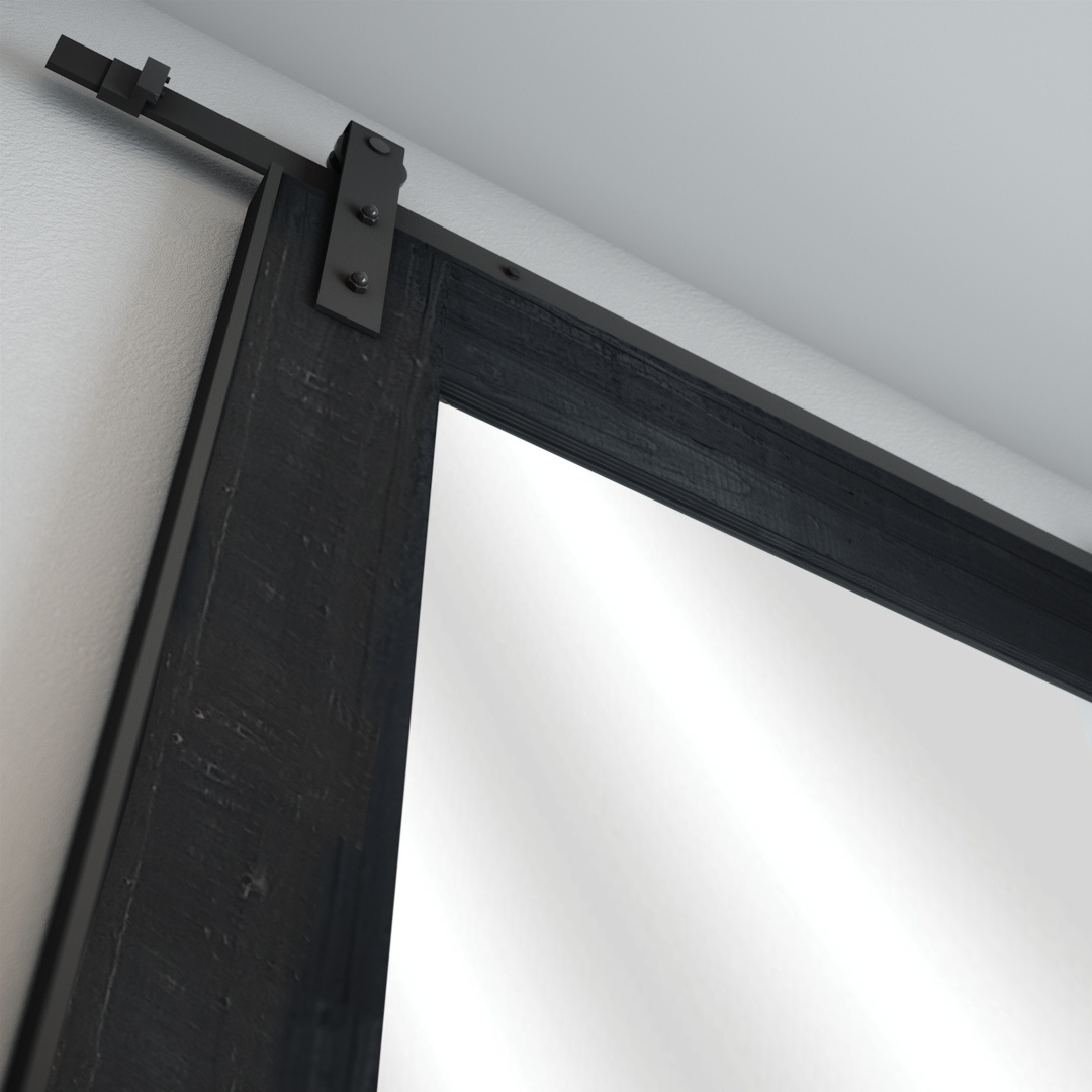 Close-up of a sliding door track system attached to a wall, with the Beveled Mirror Barn Door in Espresso Finish partially visible.