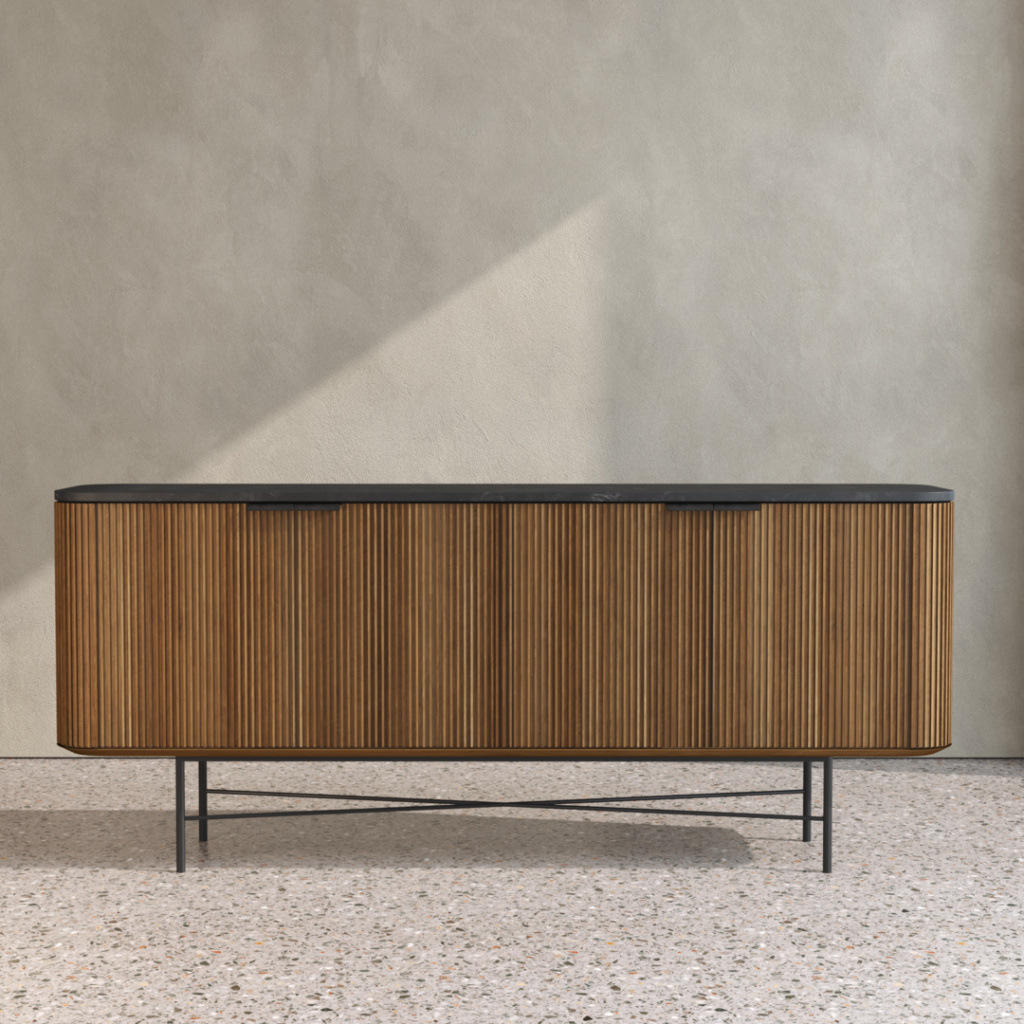 The Osaka Dining Buffet, featuring vertical wooden slats and slender metal legs, stands against a light-colored wall on a speckled terrazzo floor.