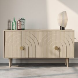 The Azul 58" Side Cabinet is a light wood sideboard adorned with circular patterns on the doors, elegantly topped with a lamp and several decorative bottles, perfectly blending style and practicality.