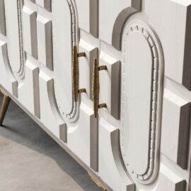 Close-up of the Lugo 60" Side Cabinet, featuring a white textured finish, gold handles, and geometric patterns—perfect for adding a touch of elegance to any room. This exquisite piece showcases superb craftsmanship.
