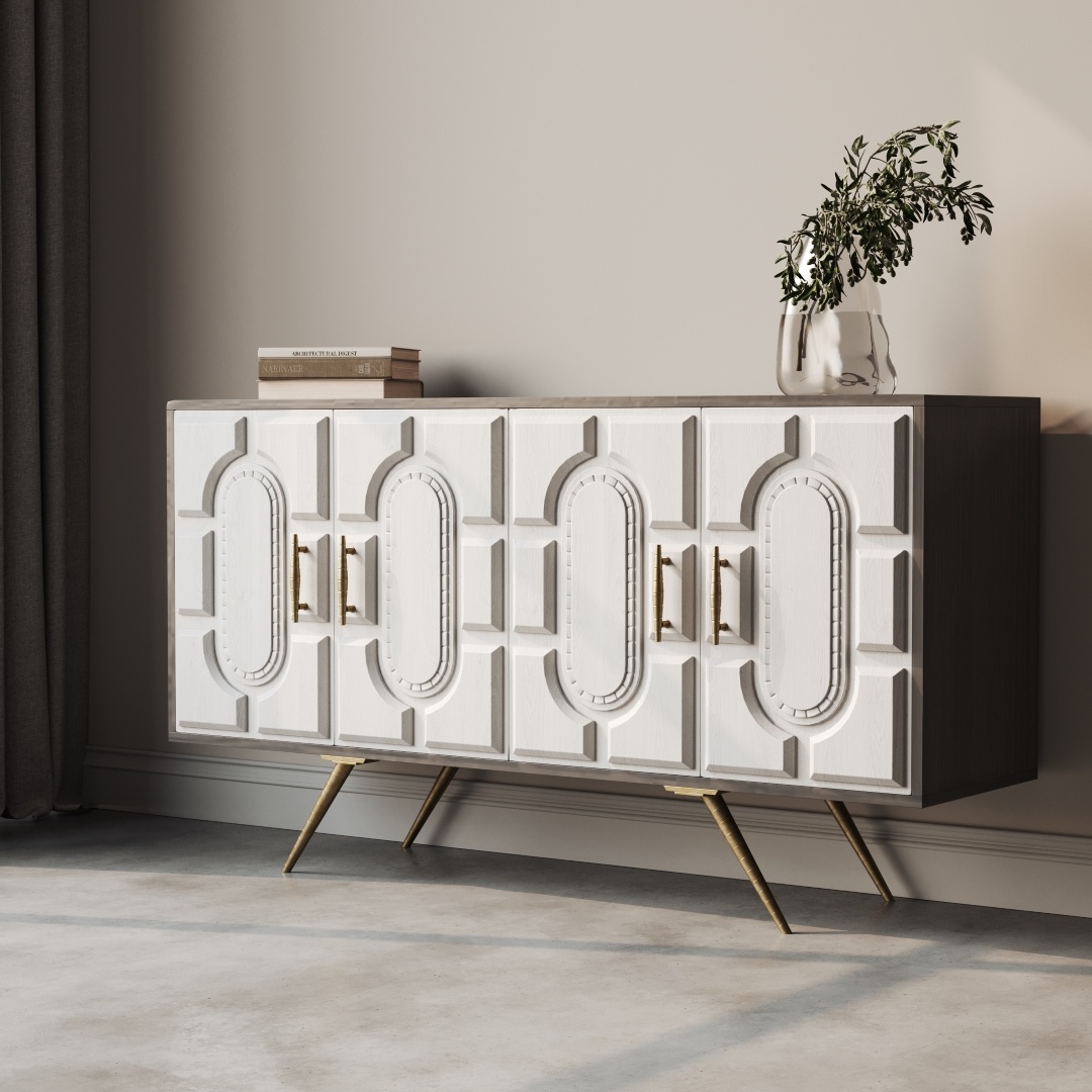 Lugo 60 Side Cabinet-e The Lugo 60" Side Cabinet is a white sideboard featuring geometric panel designs and gold handles, mounted on angled legs. Atop the cabinet, you'll find a vase with greenery and a stack of books.
