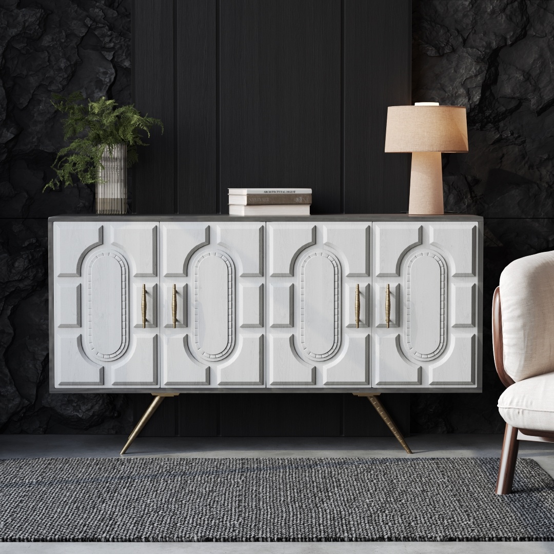 Lugo 60 Side Cabinet-f A white Lugo 60" Side Cabinet adorned with geometric patterns, set against a dark wall and topped with a lamp, a small stack of books, and a fern in a vase, next to a beige chair on a gray rug.