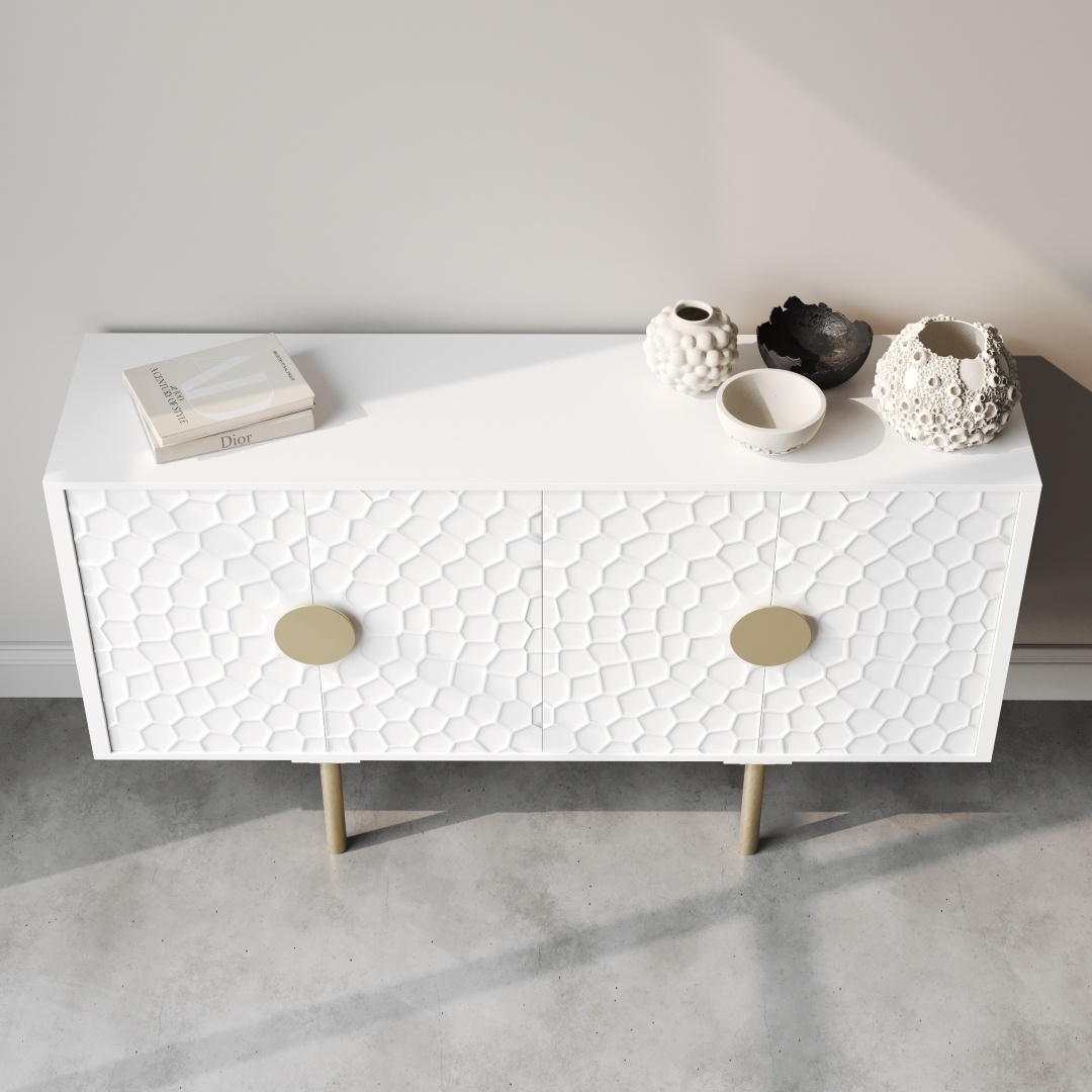 Luna 60 Side Cabinet-e A Luna 60" side cabinet in white textured finish, equipped with circular handles, stands against a light gray wall on a concrete floor. Its surface showcases three decorative vases and two books, adding an elegant touch to any space.