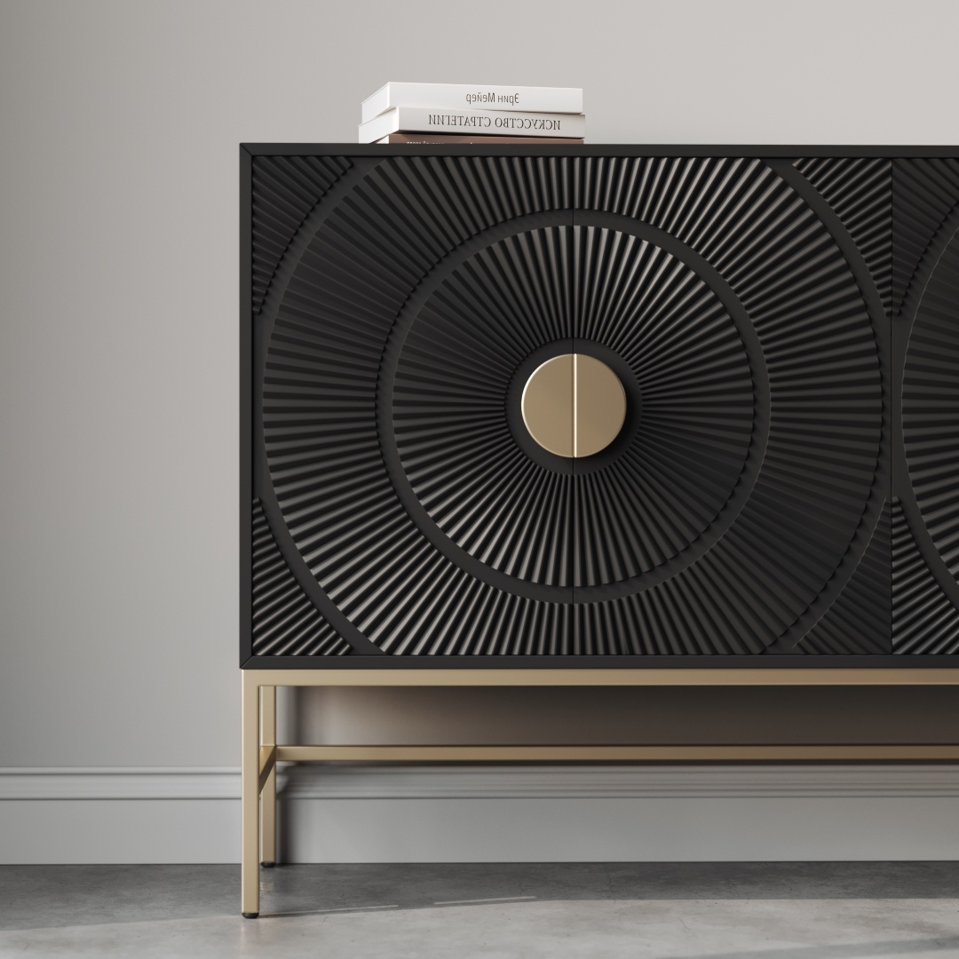 Orbita 60 Side Cabinet-b A black, textured Orbita 60" Side Cabinet with circular patterns on the doors, two central handles, and a metallic frame stands against a gray wall. Three books are placed on top. This sideboard seamlessly combines style and functionality.