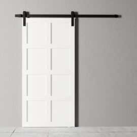 An 8-Panel Barn Door in white with a black metal track, installed on a light gray wall.