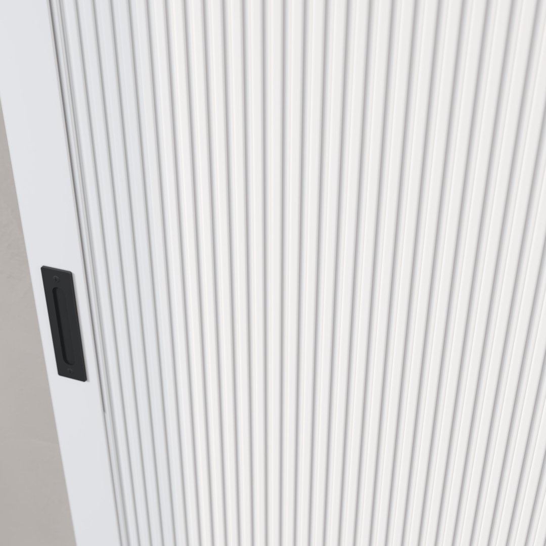 CELINE-OVAL-FLUTTED-PANEL-BARN-DOOR-1.jpg Close-up of the Celine Oval Flutted Panel Barn Door, featuring a white, vertically ribbed design and a black recessed handle on the left side.