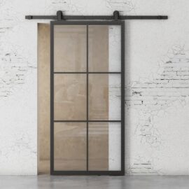 French Casement 6-Panel Barn Door installed against a white, cracked wall with a rustic and minimalist design.