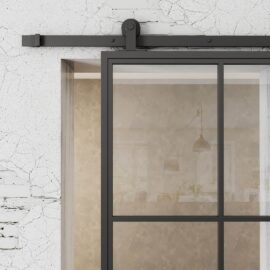 French Casement 6-Panel Barn Door installed on a cracked white wall, revealing a glimpse of an interior room with light fixtures and patterned wallpaper.