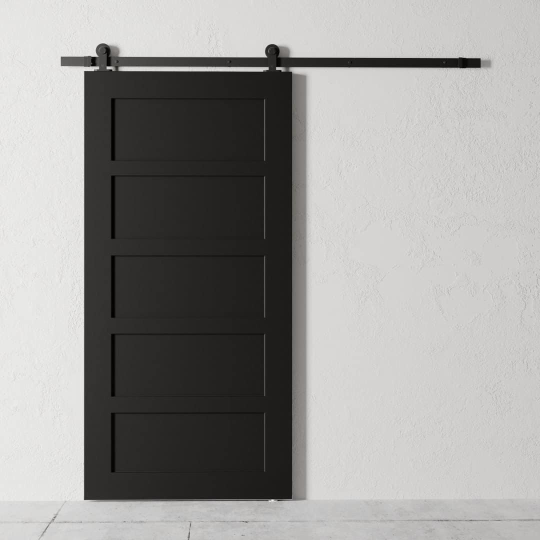 A 5-Panel Barn Door in black is mounted on a white wall using a sleek black metal rail system.