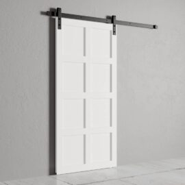 An 8-Panel Barn Door with a rectangular panel design is mounted on a black sliding rail, set against a gray wall.
